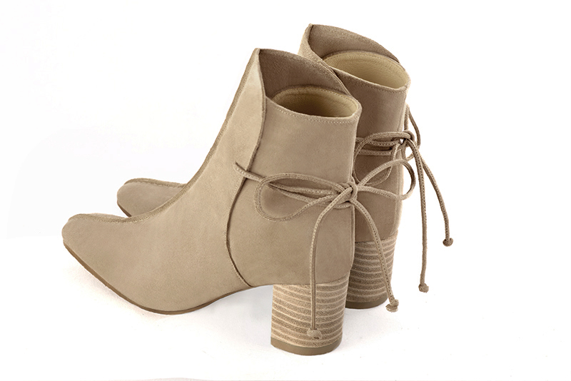 Tan beige women's ankle boots with laces at the back. Square toe. Medium block heels. Rear view - Florence KOOIJMAN